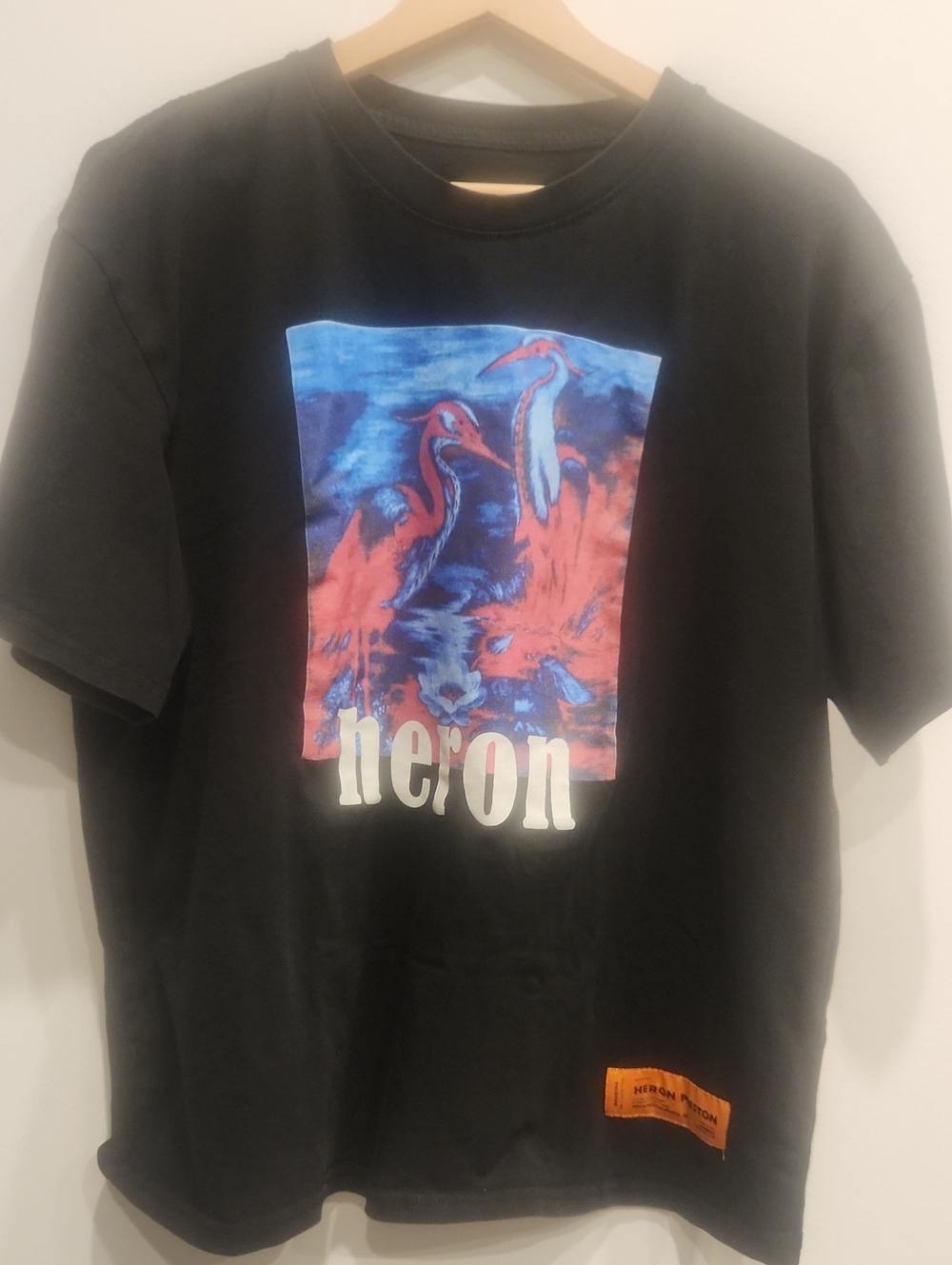 Heron Preston Black Tee with Blue and Red Heron Graphic Made in Italy.